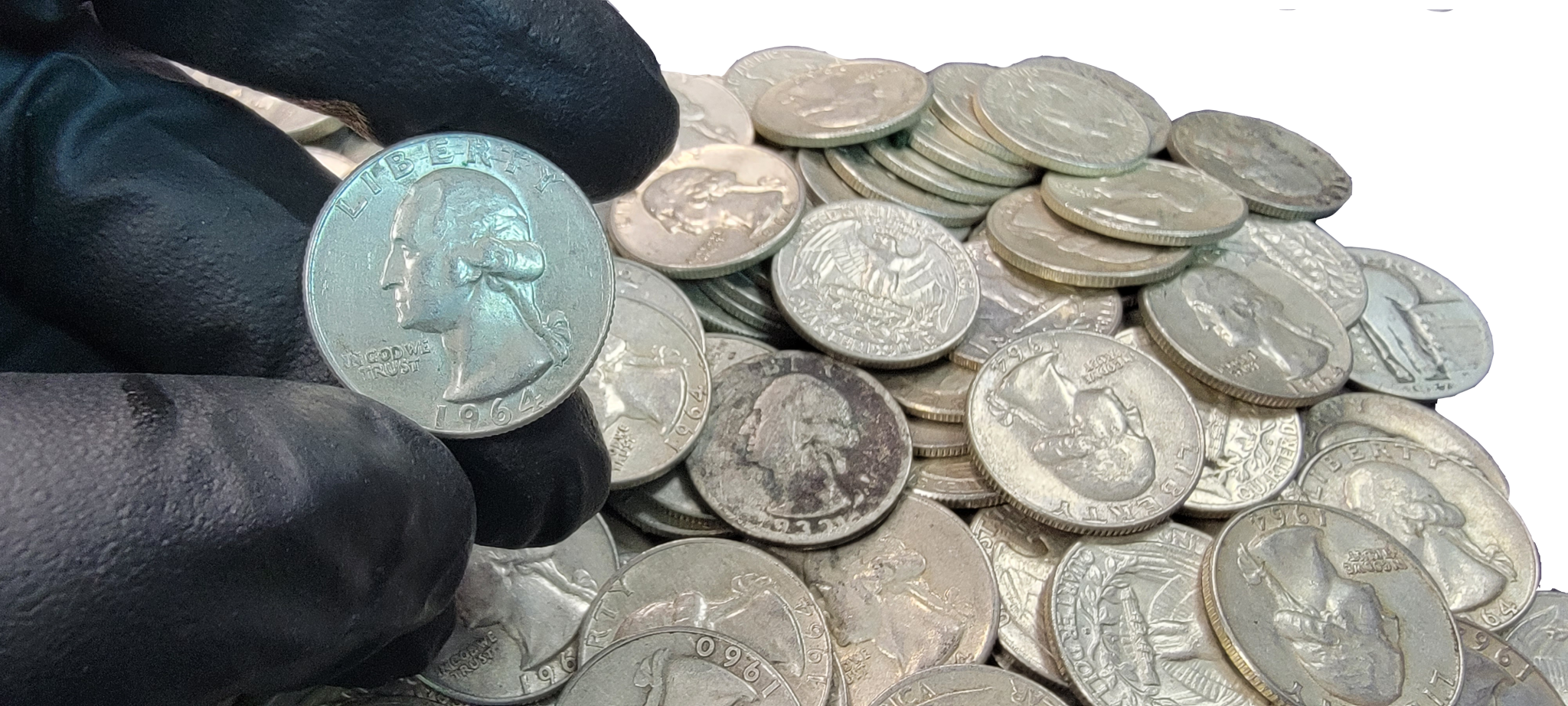Hand holding 90% junk silver coins